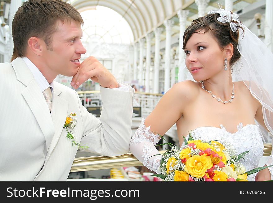 Newly married together in a photo pose