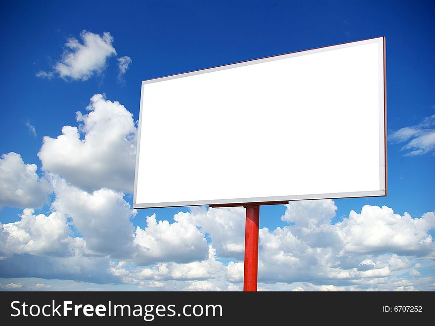 Advertising billboard on sky background