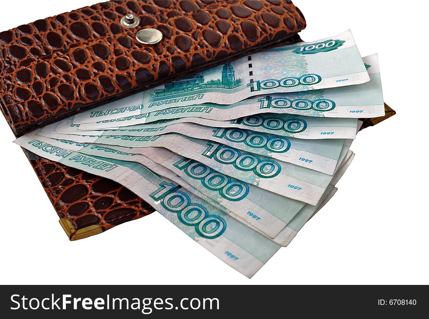 A designer leather purse with 1000 Ruble notes, on a white background. A designer leather purse with 1000 Ruble notes, on a white background.
