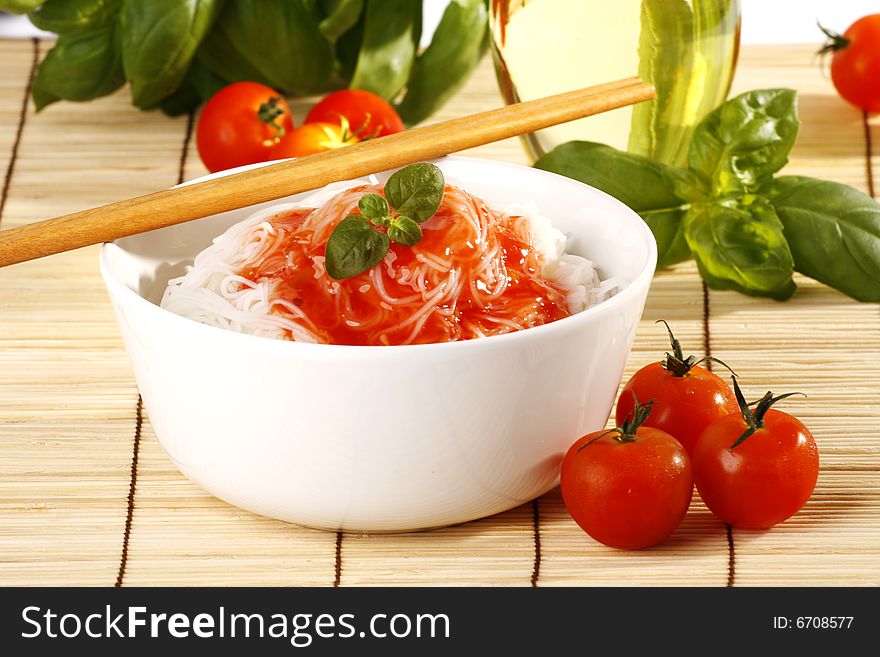 Tasty rice pasta with tomatoes