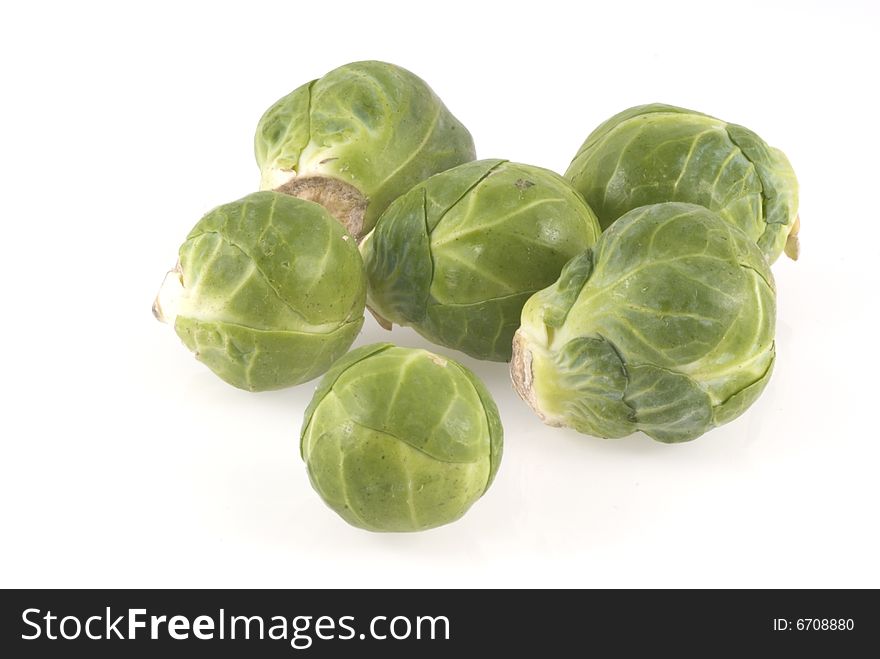 Couple of brussels sprouts isolated on a white background. Couple of brussels sprouts isolated on a white background.