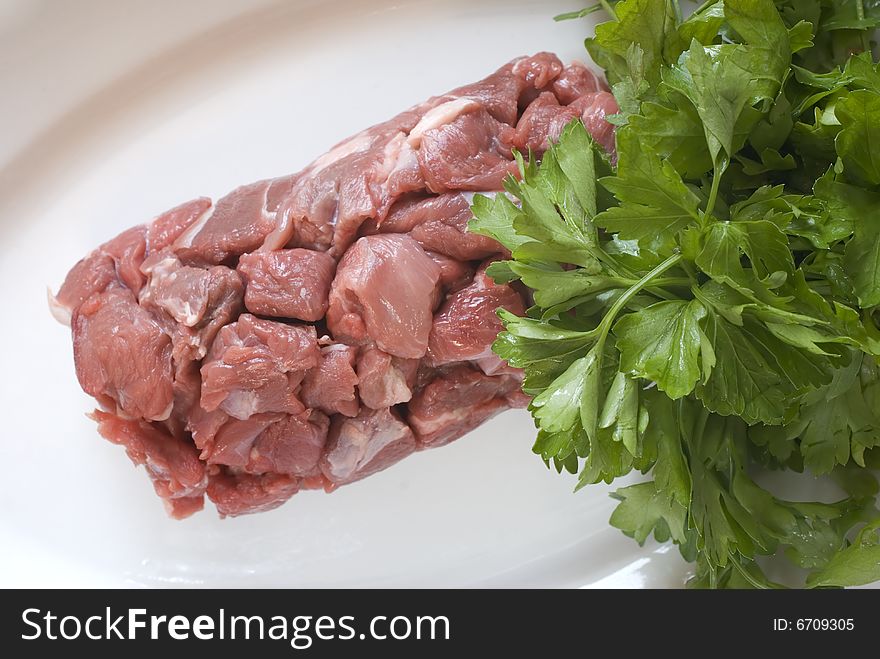 Chopped meat and parsley on the plate
Studio shot and close up (macro) lens