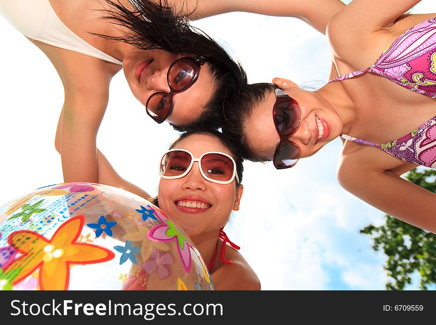 Group of asian girls having fun under the bright blue sky. Group of asian girls having fun under the bright blue sky