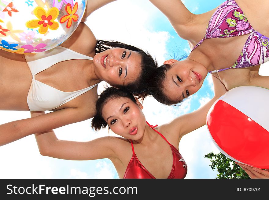 Group of asian girls having fun under the bright blue sky. Group of asian girls having fun under the bright blue sky