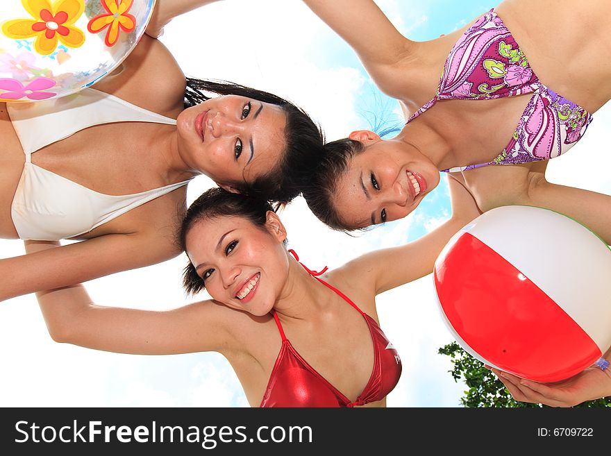 Group of asian girls having fun under the bright blue sky. Group of asian girls having fun under the bright blue sky