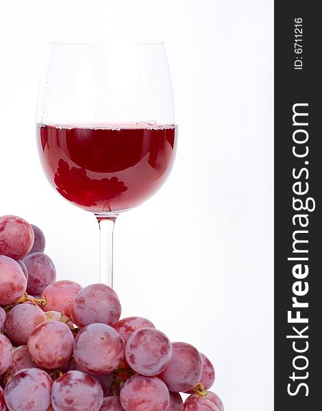 Red wine with glass. White background.