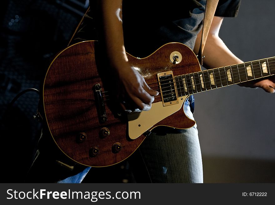 Guitarist of a rock band with a guitar