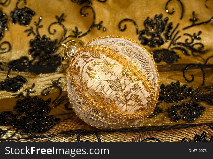 Christmas ornament, photo on the fabric background