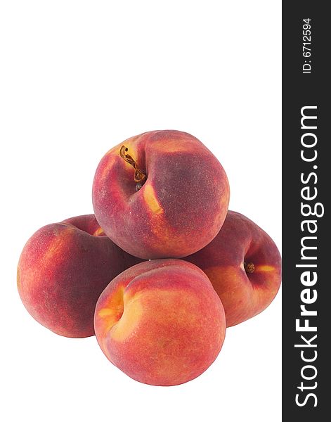Ripe peaches isolated on white