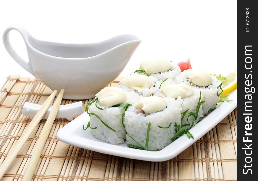 Japanese Cuisine - Rolls with Sauce and Greens