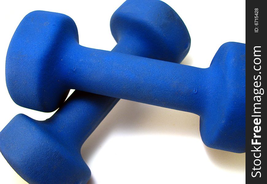 A pair of blue dumbbells on a white background