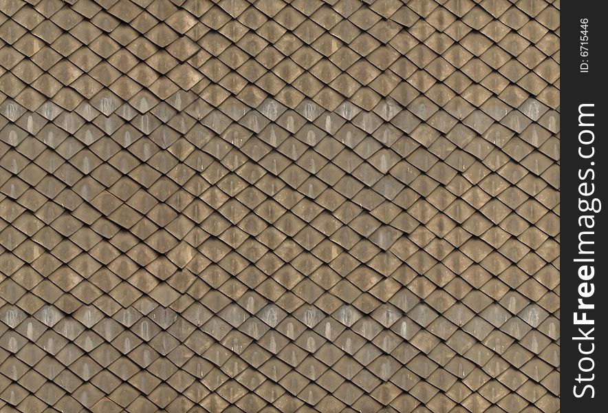 Ancient roof, brown and grey, texture suitable for iterations, skins of buildings. Ancient roof, brown and grey, texture suitable for iterations, skins of buildings