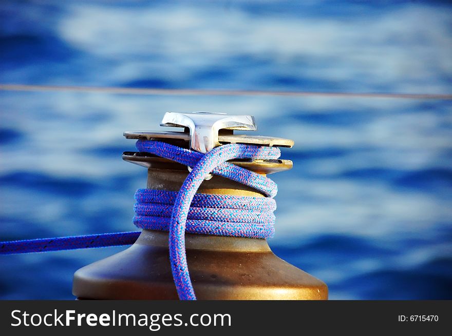 Shot of a winch and ropes on a yacht