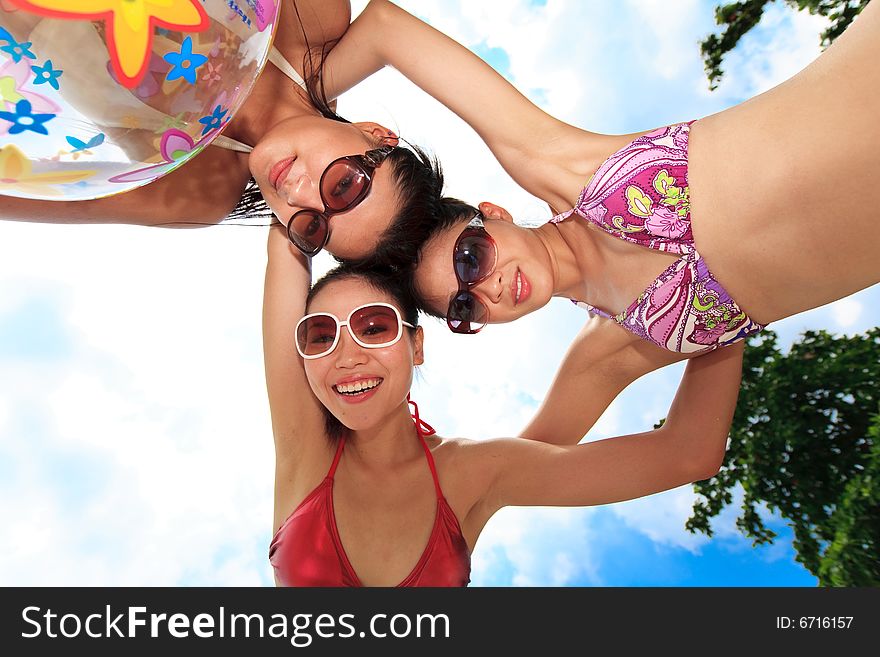 Group of asian girls having fun under the bright blue sky. Group of asian girls having fun under the bright blue sky