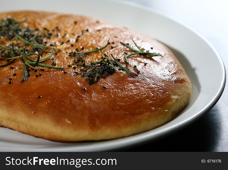 Bread served with spices on top