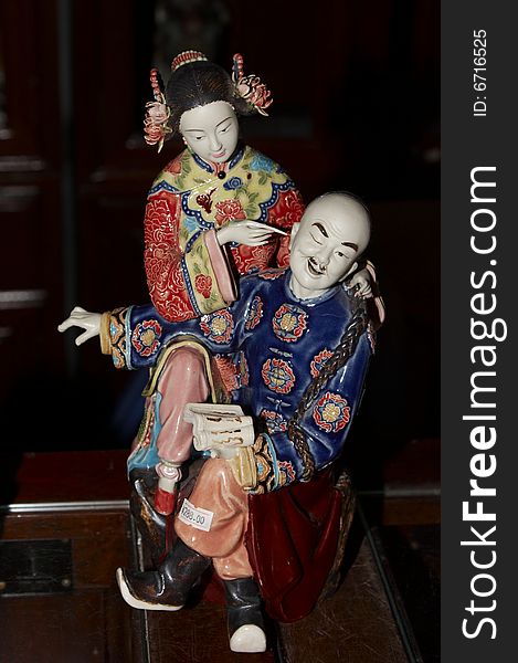 Pottery figure of a couple in tang costume