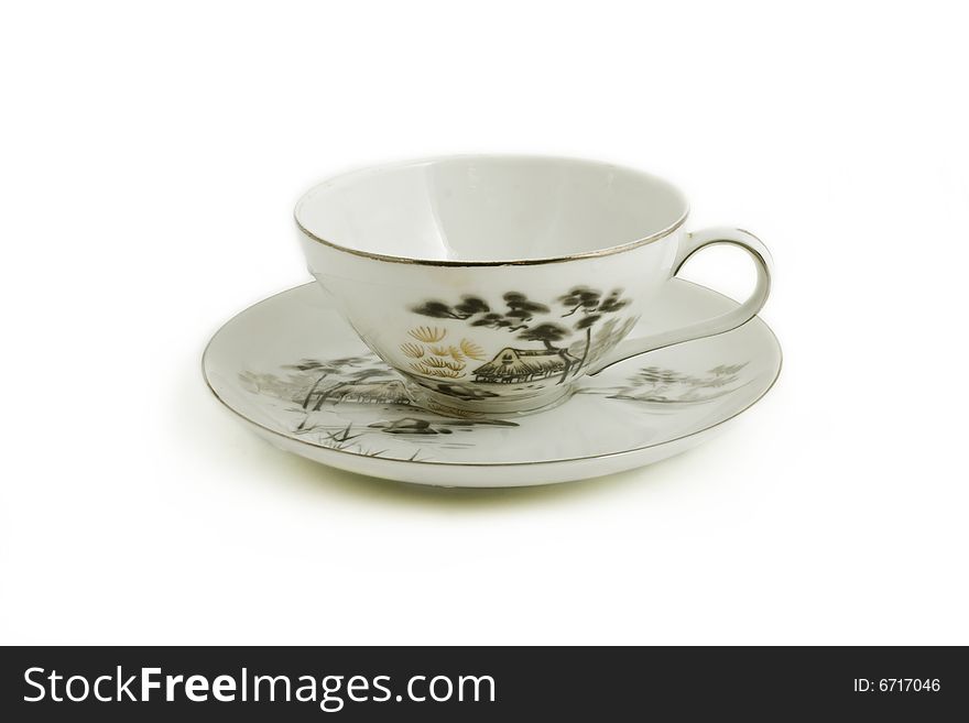 Cup and saucer isolated on white background
