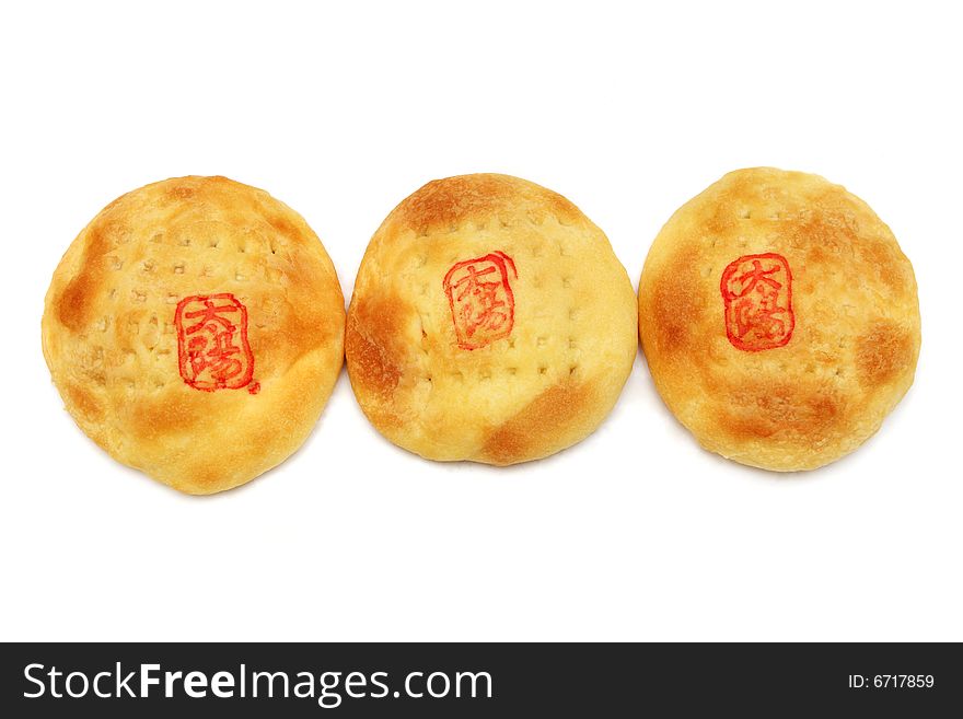 Three pieces of Chinese cream pastry isolated on white background.