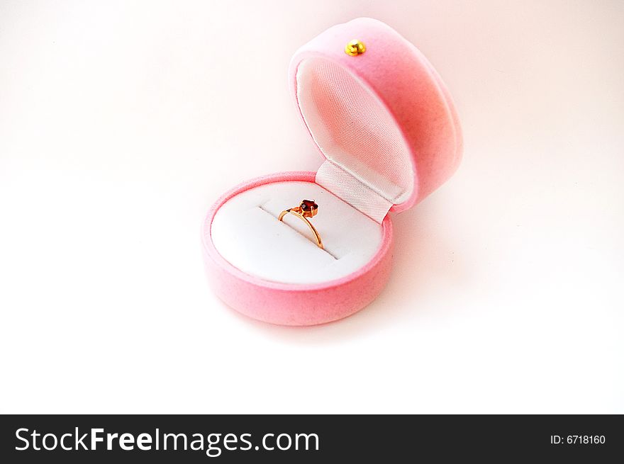 Wedding ring with a ruby. In a box heart