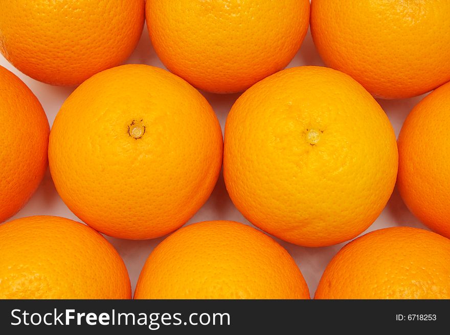 Close up of many oranges as fruit background.