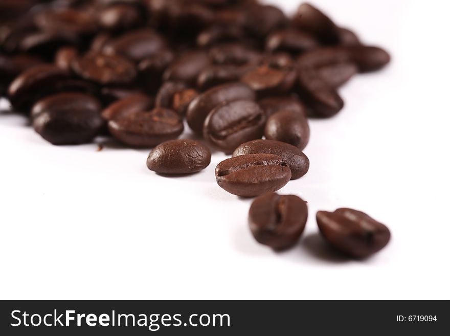 Coffee beans on white background (macro). Coffee beans on white background (macro)