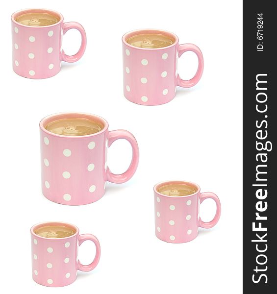 Shot of some pink polka dot mugs with hot drinks in them. Shot of some pink polka dot mugs with hot drinks in them