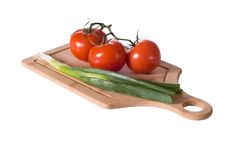 Vine Tomatoes And Green Onions Royalty Free Stock Photos Vine Tomatoes And Green Onions Royalty Free Stock Photos