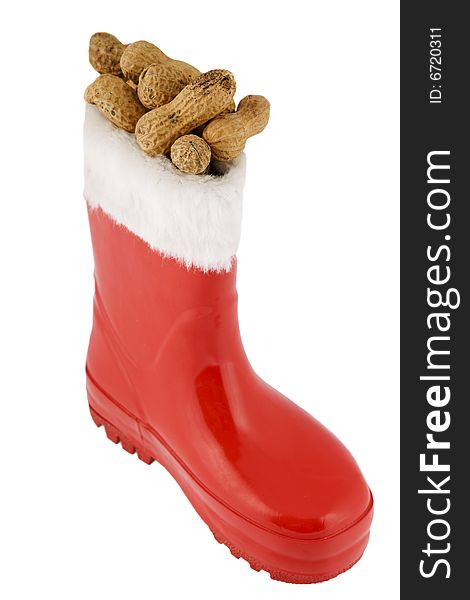Red boot with peanuts, as a symbol for Santa Claus