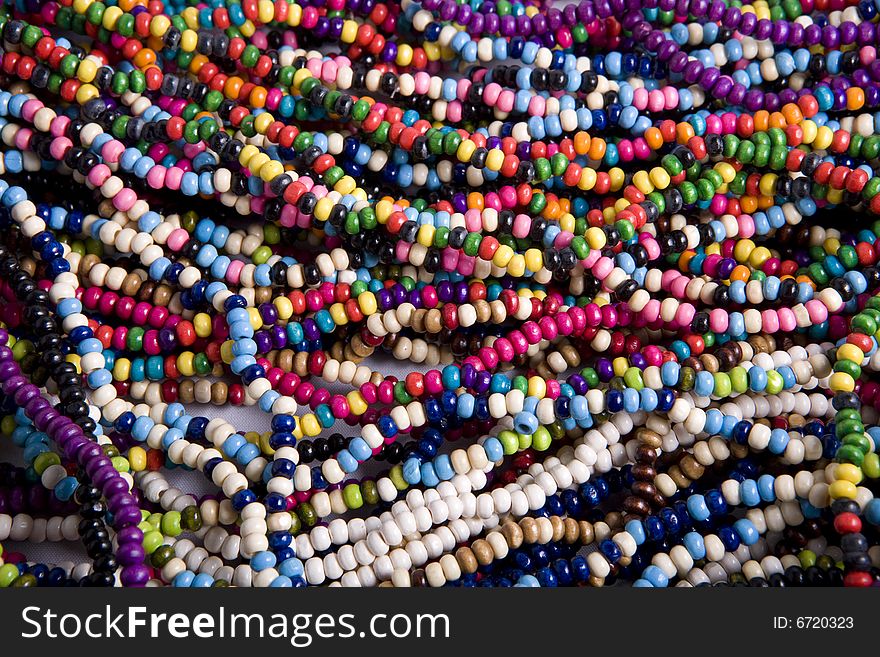 A string of colorful  beads. A string of colorful  beads