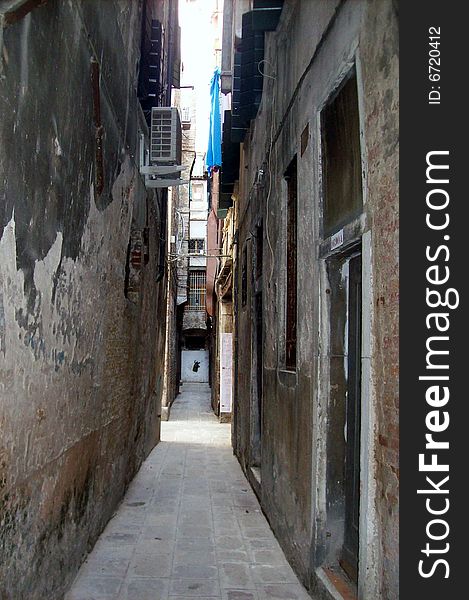 Narrow alley in an old residential area city. Narrow alley in an old residential area city