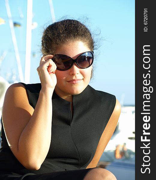 Young Woman In Sunglasses