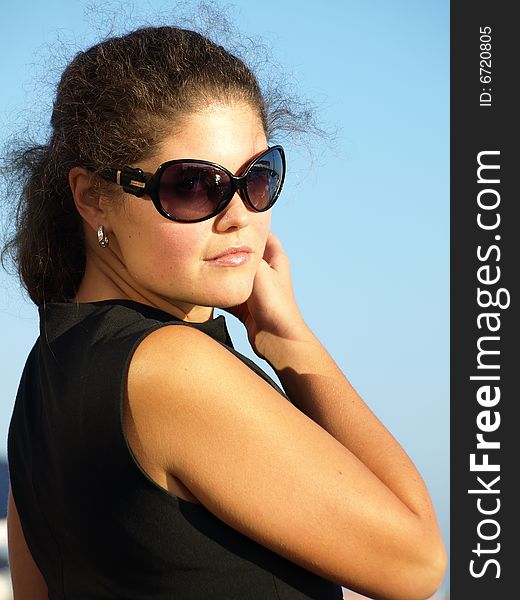 Young Woman In Sunglasses