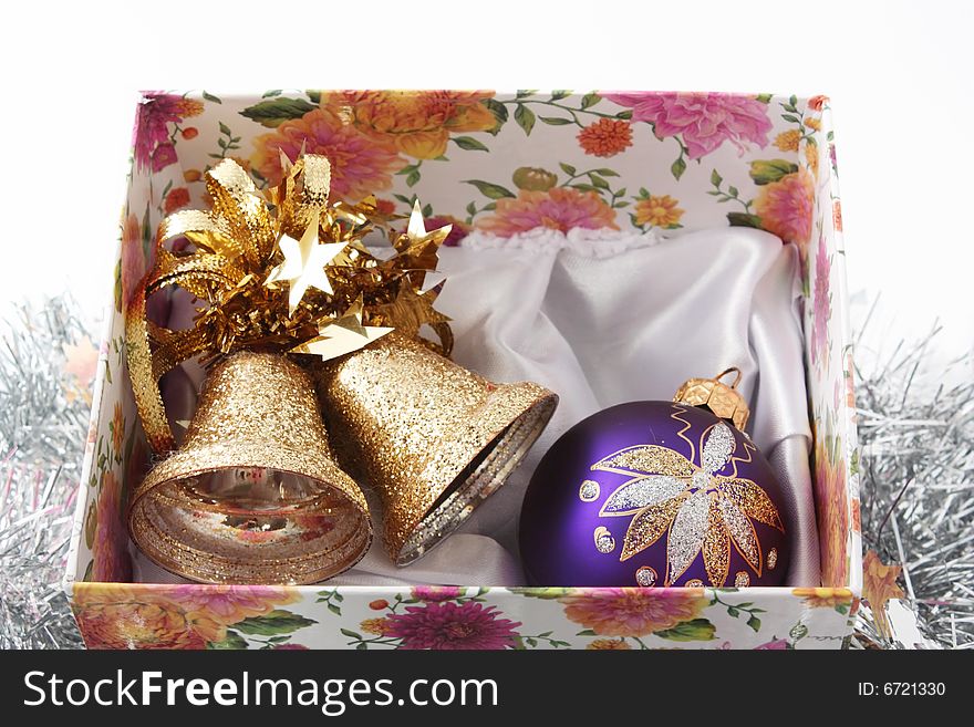 Christmas handbells and fir-tree toy in a box. Christmas handbells and fir-tree toy in a box