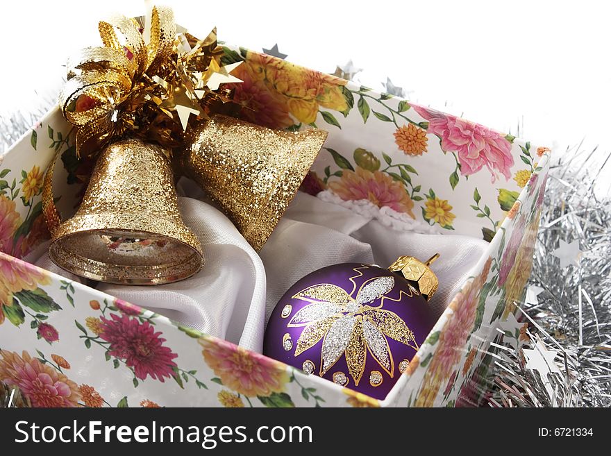 Christmas handbells and fir-tree toy in a box. Christmas handbells and fir-tree toy in a box