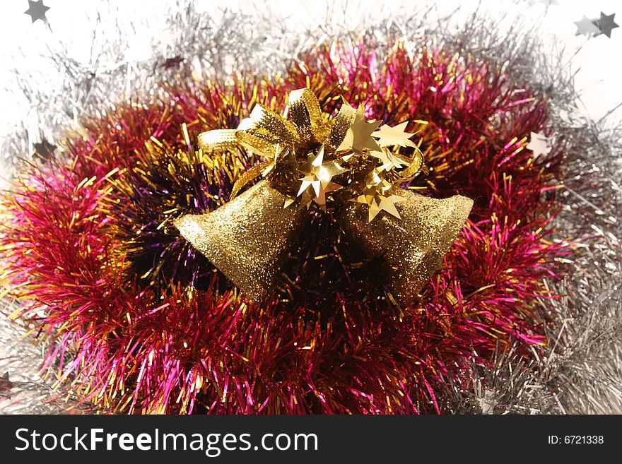 Christmas hand bells in a celebratory tinsel. Christmas hand bells in a celebratory tinsel