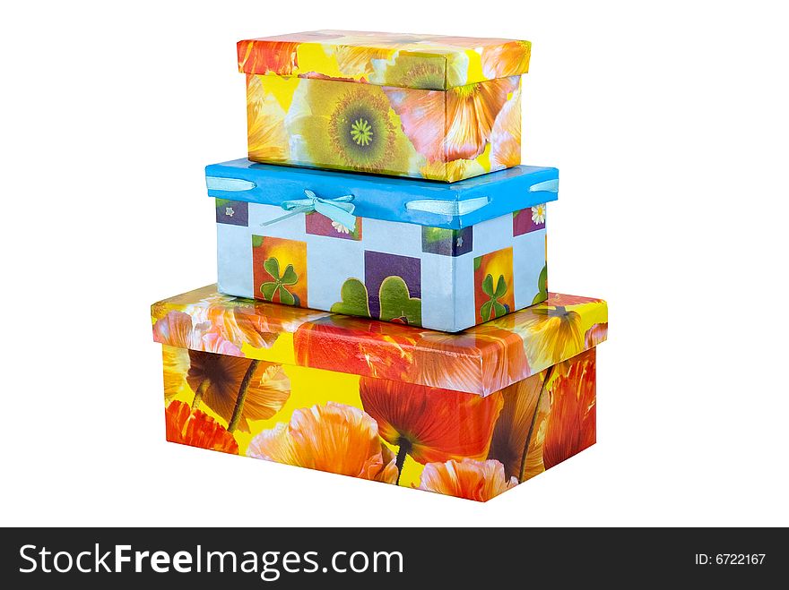 Gift boxes of yellow-red color on the white background