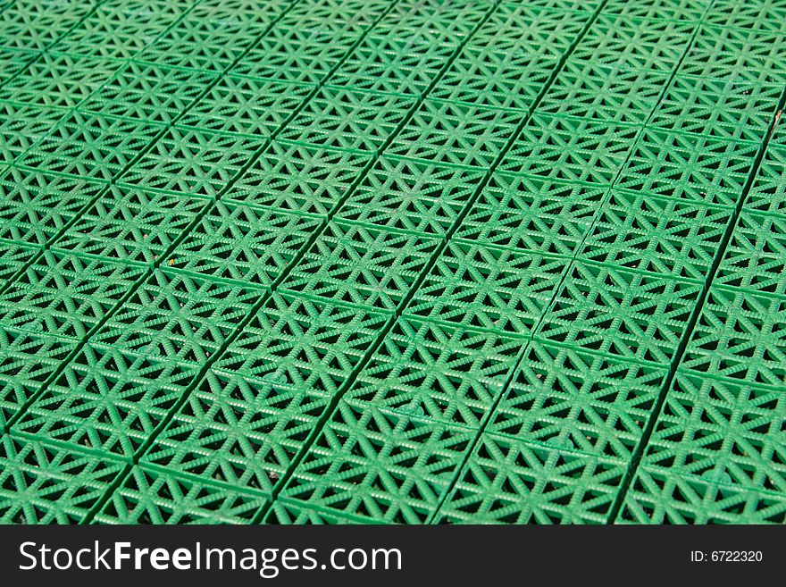 Artificial tennis court cover, green, close-up