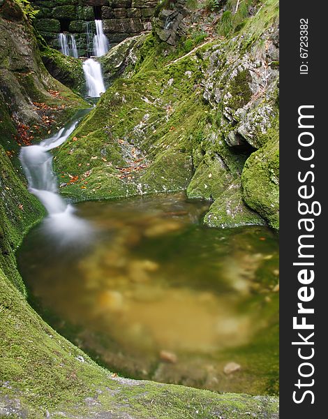 Waterfall on mountain stream