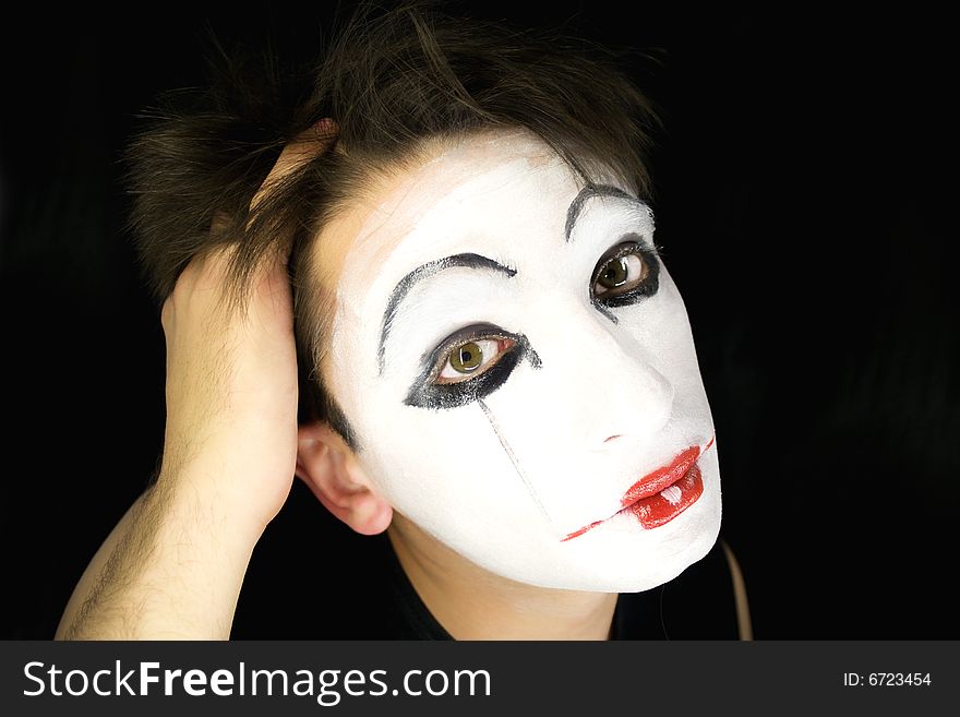 Portrait of the mime on a black background