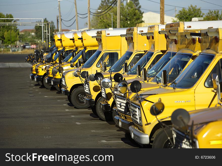 A sotrage yard that hosues the buses when not in use. A sotrage yard that hosues the buses when not in use