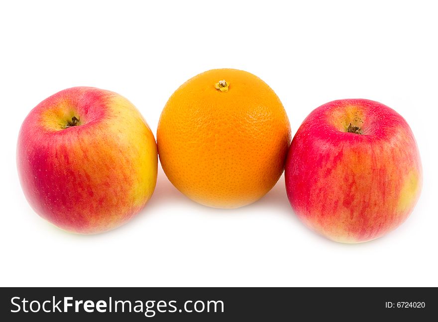 Beautiful and tasty orange with red useful apples on white background