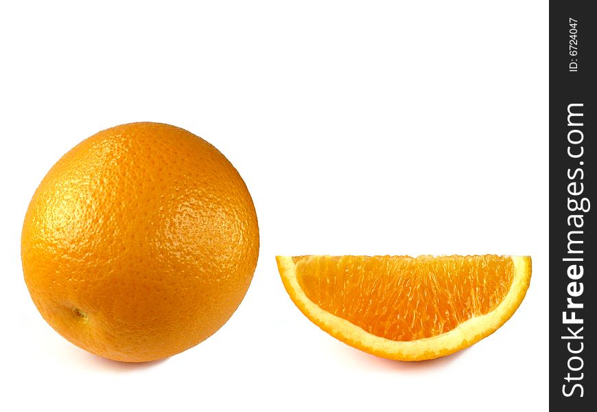 Orange fruit with cut segment isolated