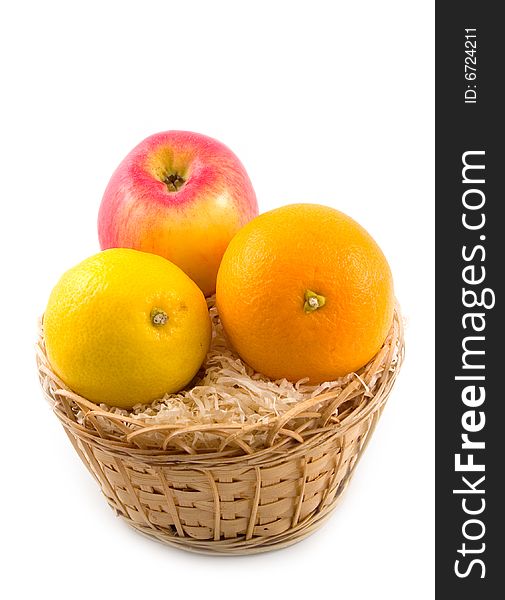 Sour lemon with beautiful fruit orange and apple in basket on white background