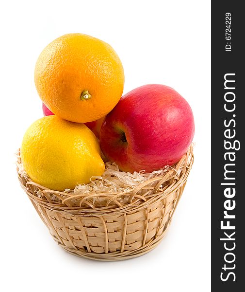 Tasty beautiful orange yellow lemon and ripe red apples on white background