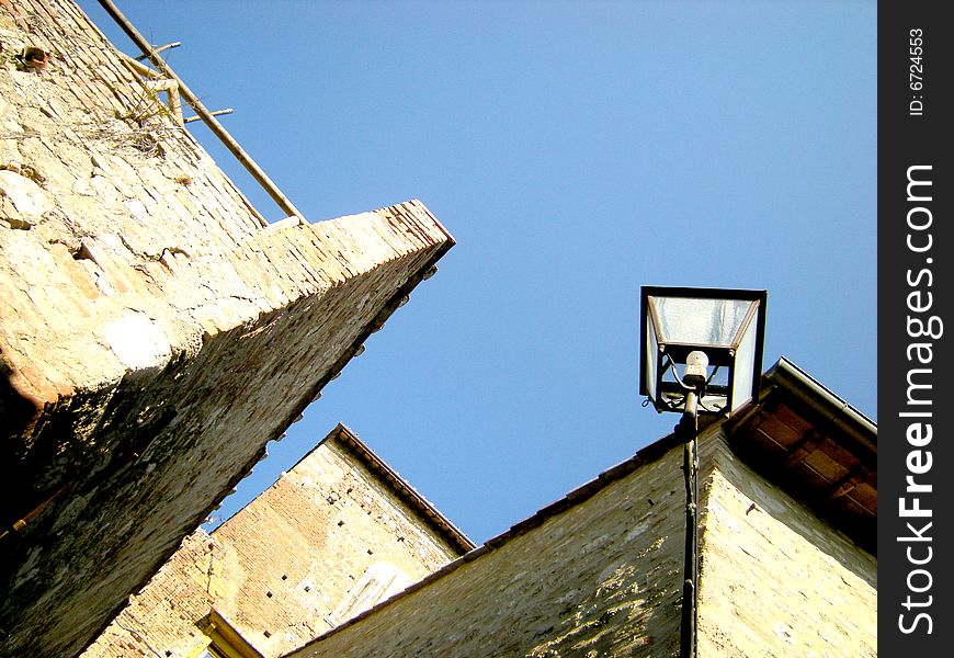 Glimpse of old walls characteristic of the Tuscan country