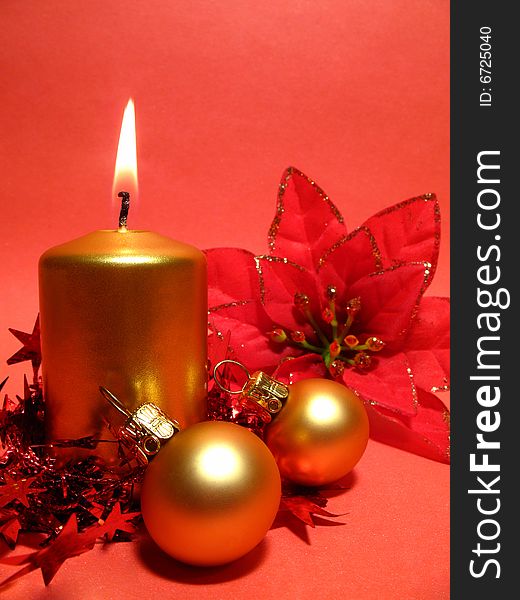 Red Christmas still life with balls and candle. Red Christmas still life with balls and candle