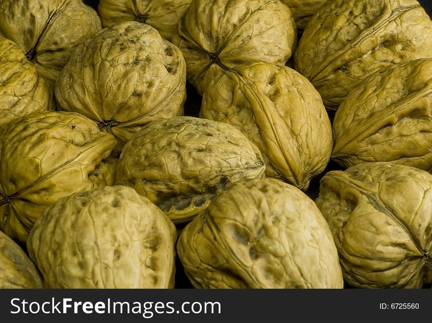 A closeup texture of some walnuts. A closeup texture of some walnuts