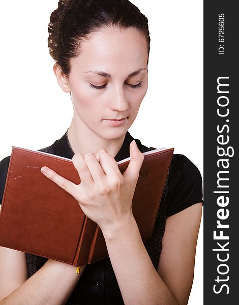 Young woman with a diary on white background. Young woman with a diary on white background