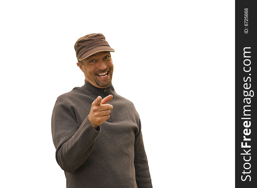 Smiling man pointing finger at someone