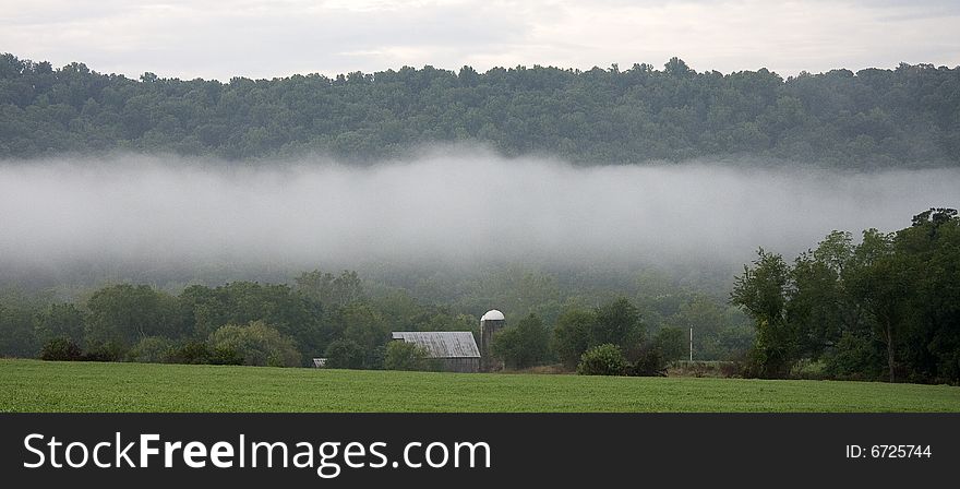 Mist rising from the Shenandoah River below the Blue Ridge Mountain. Mist rising from the Shenandoah River below the Blue Ridge Mountain